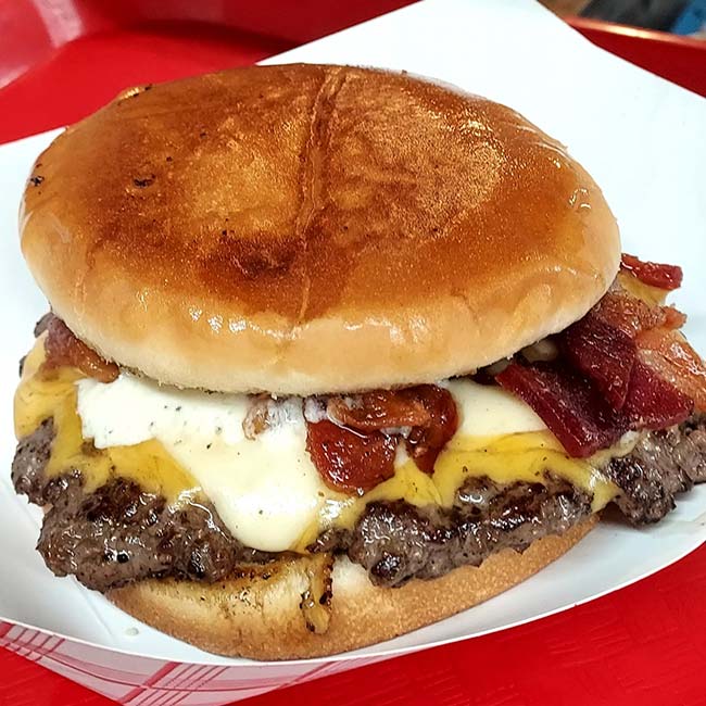 The double d cheeseburger served at Bill's Burgers, Wings and Things restaurant and bar in Burnet, TX